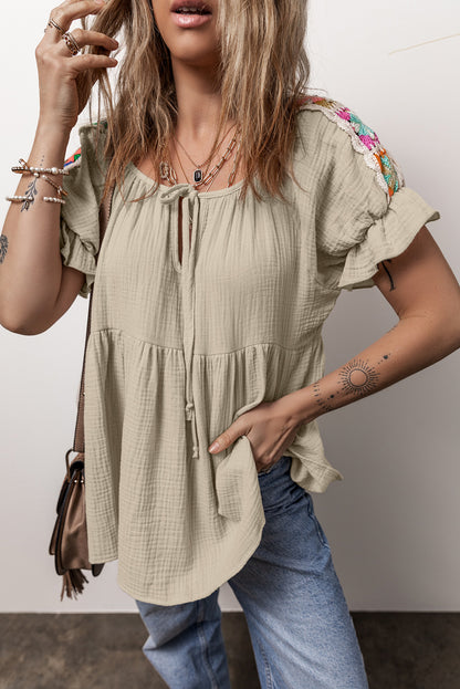 Embroidered Tie Neck Short Sleeve Blouse