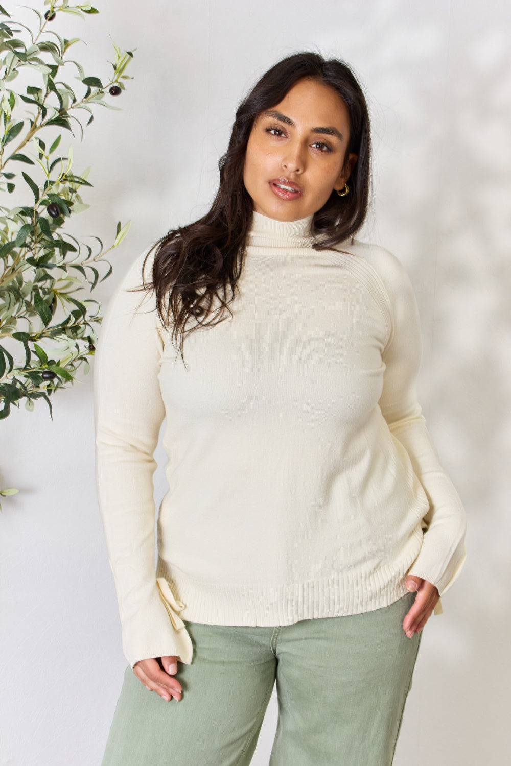 Heimish Full Size Ribbed Bow Detail Long Sleeve Turtleneck Knit Top CREAM