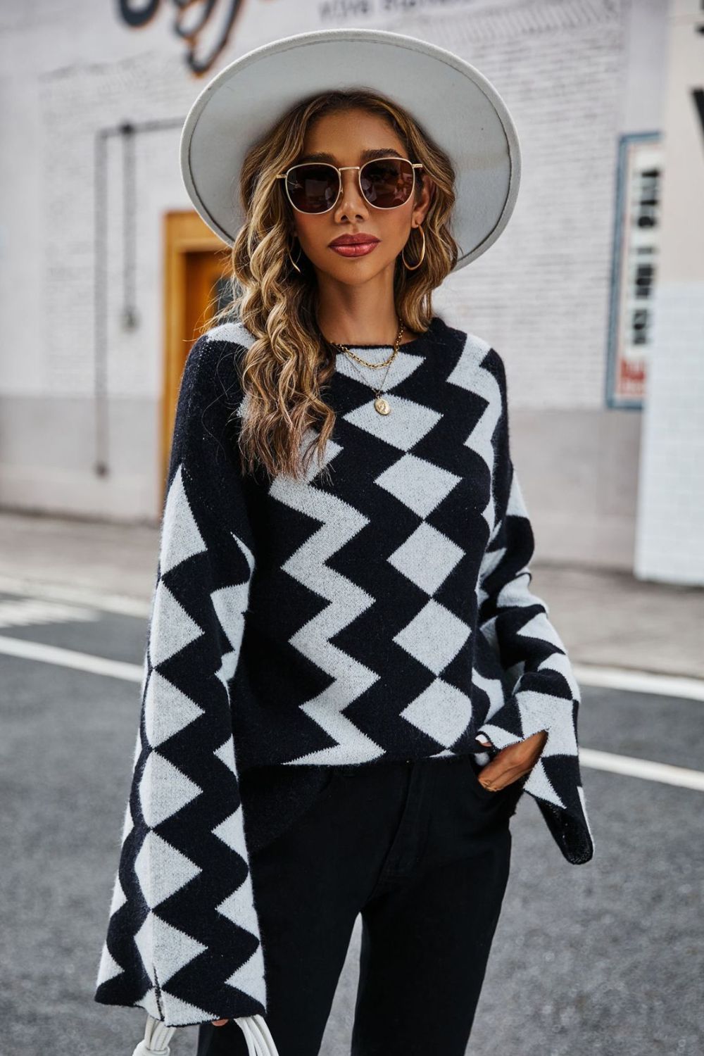 Geometric Slit Flare Sleeve Round Neck Sweater Black