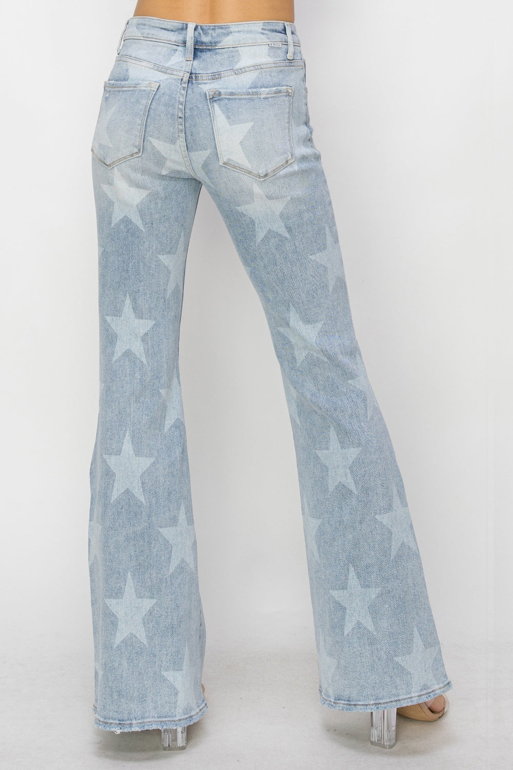 RISEN Mid Rise Button Fly Start Print Flare Jeans - Thandynie